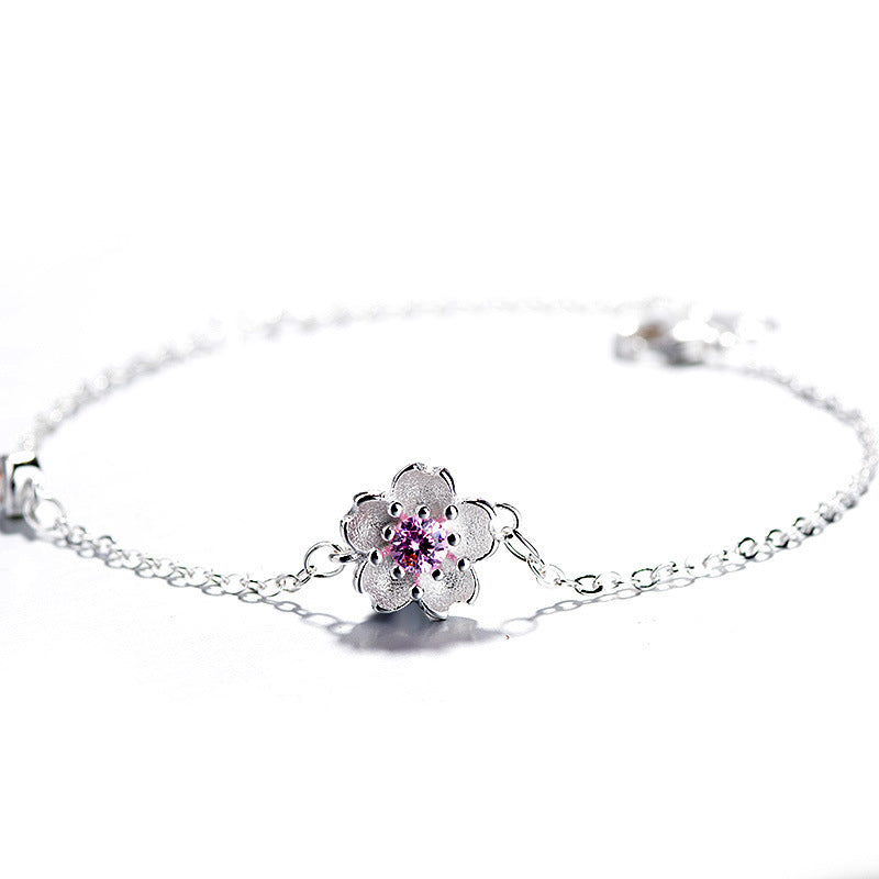 Bracelet Sweet Sakura – Chaîne en alliage réglable avec pendentif fleur de cerisier rose