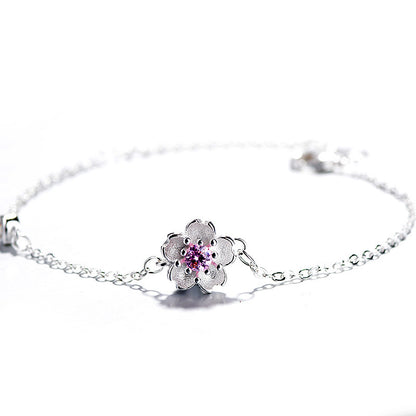 Bracelet Sweet Sakura – Chaîne en alliage réglable avec pendentif fleur de cerisier rose