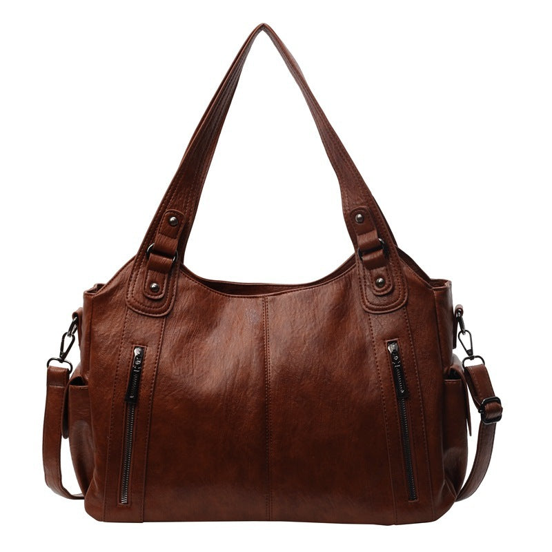 Sac à main femme rétro chic avec texture raffinée et sangle ajustable